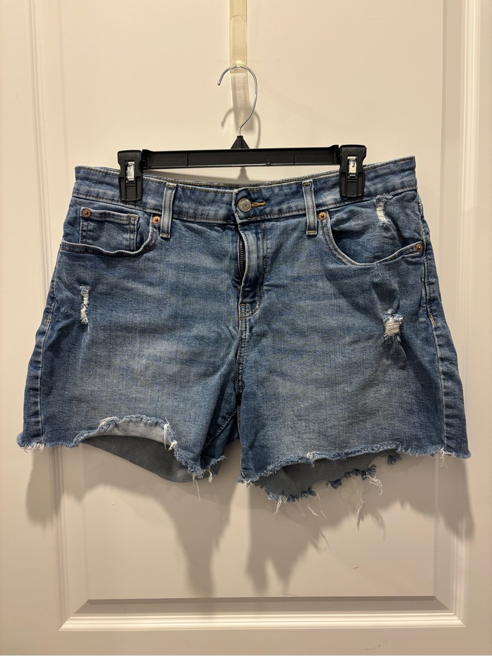 Levi's Medium Blue Frayed Hem Denim Shorts